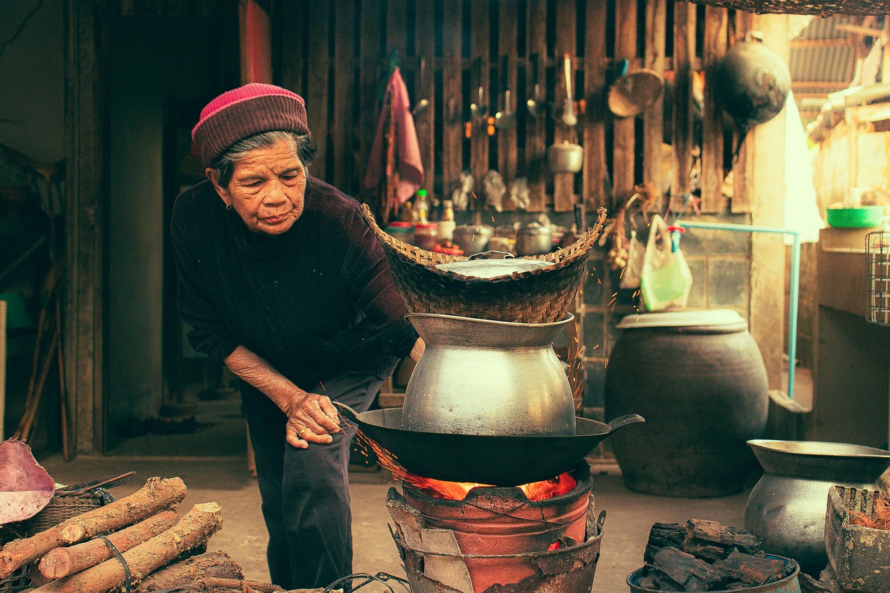Woman cooking breakfast in modern kitchen