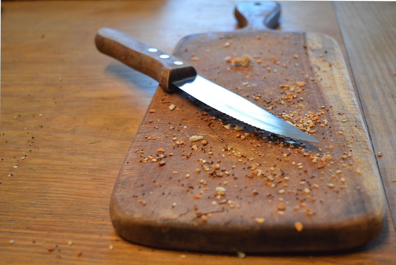 Chef knife on wooden cutting board