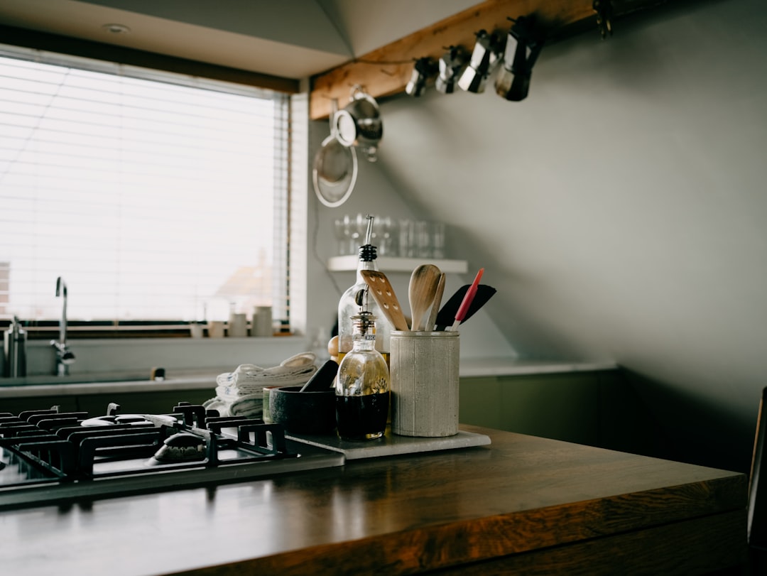 Kitchen utensils and wooden spoon