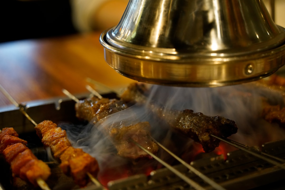 Outdoor grill with meat cooking