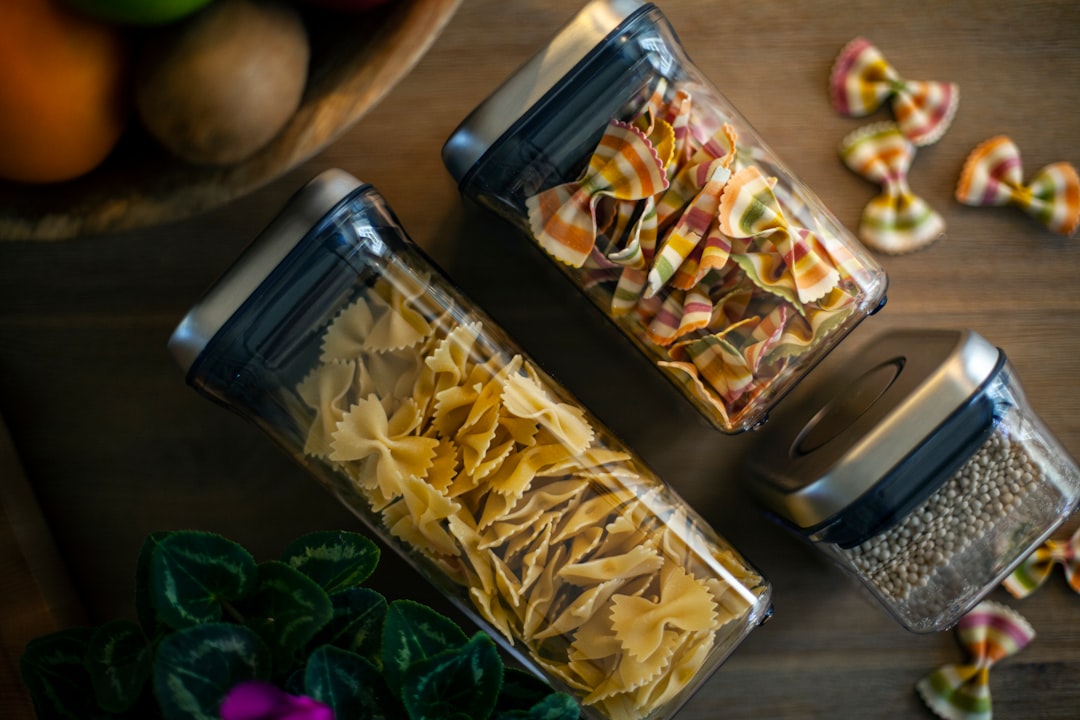 Stackable food storage containers organized on shelves
