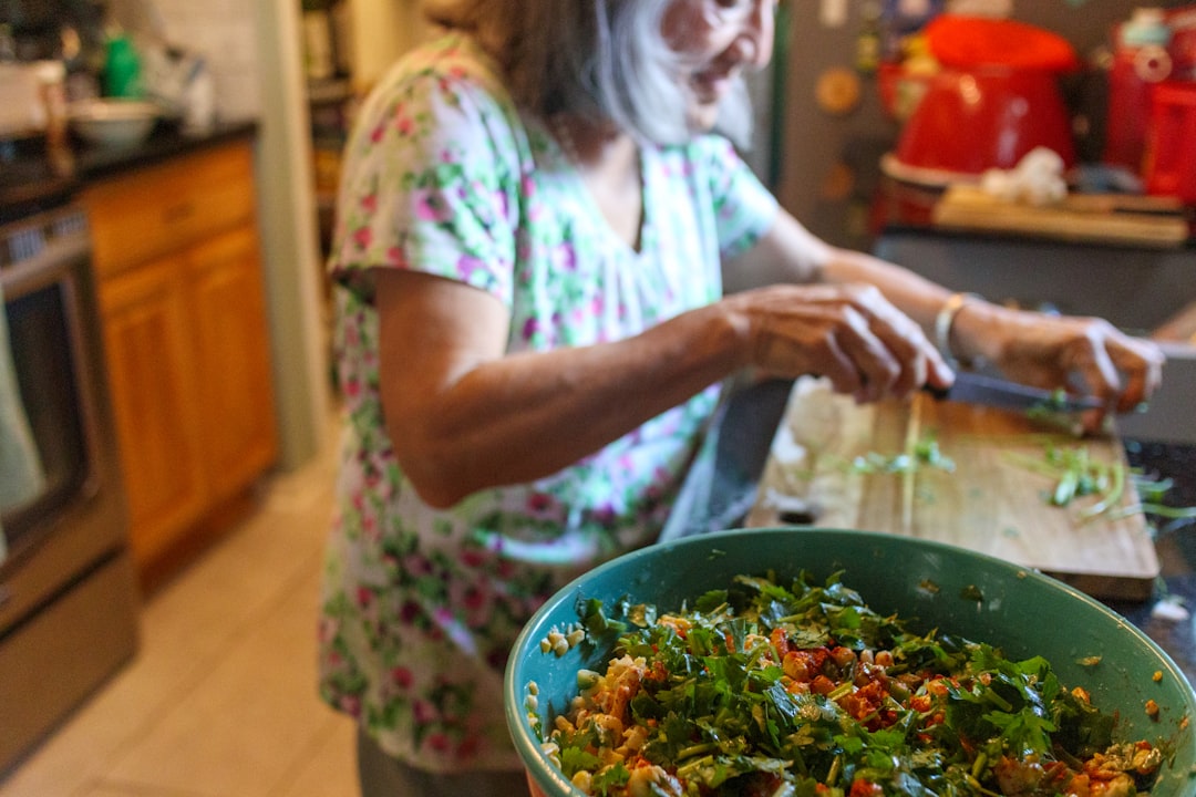 Family cooking dinner in kitchen
