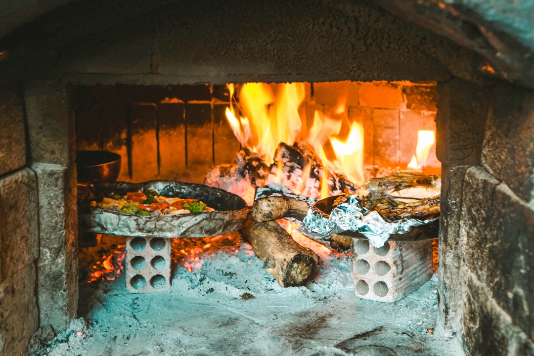 Wood-fired pizza oven cooking at high temperature