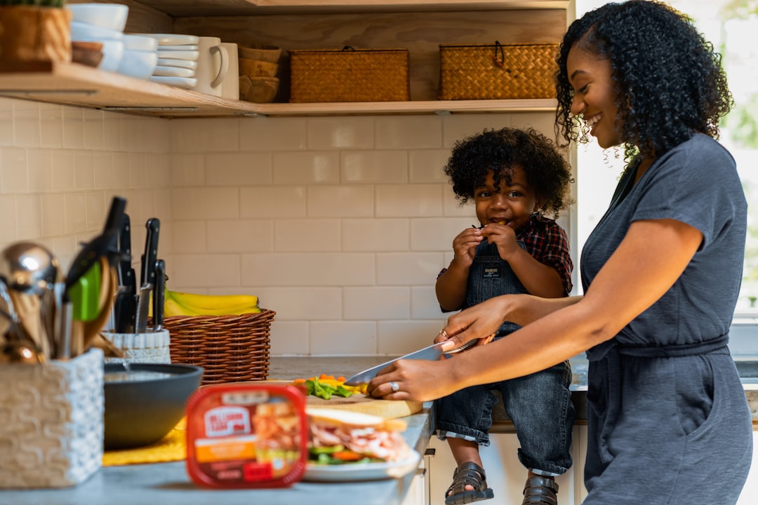 Happy family cooking together in kitchen