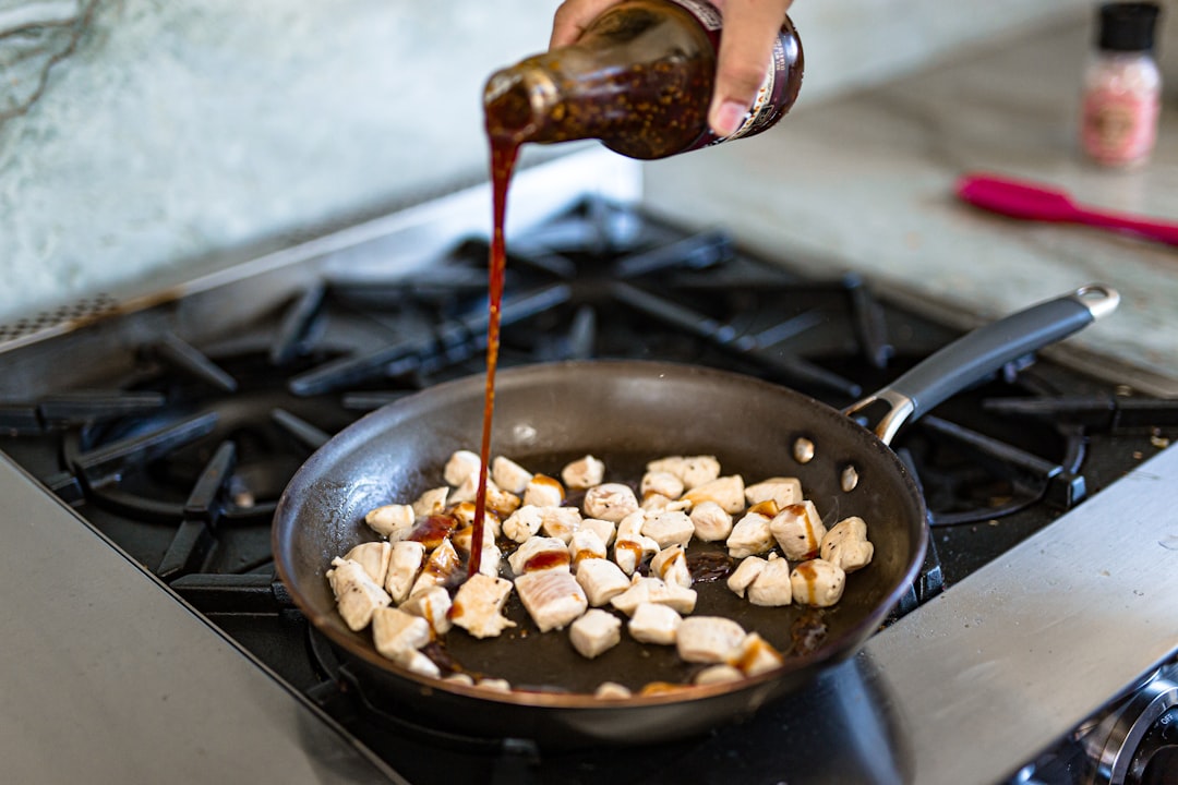 Deglazing a pan with wine for sauce