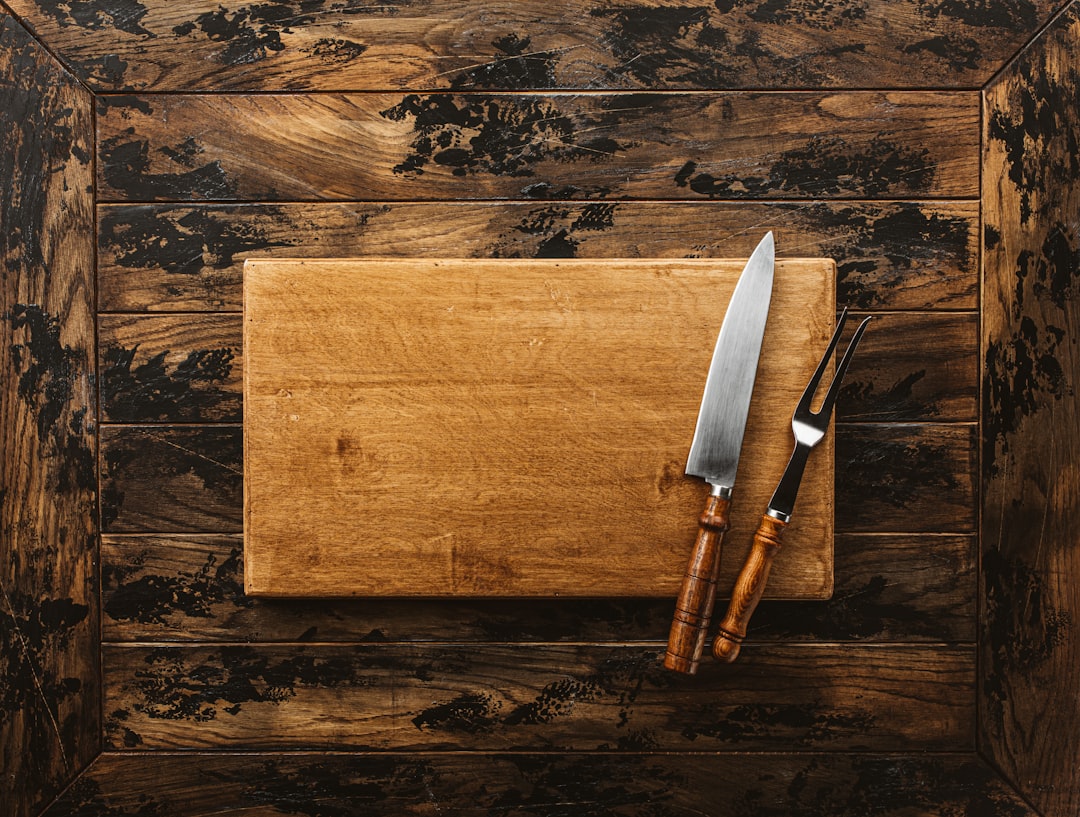 Complete kitchen knife collection on wooden cutting board