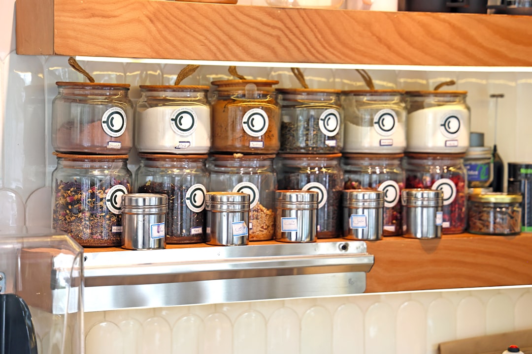 Glass food storage jars filled with pantry staples