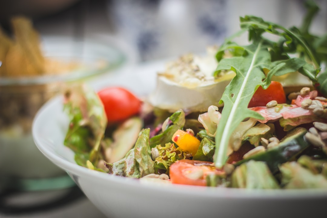 Colorful melamine serving bowls with summer salad