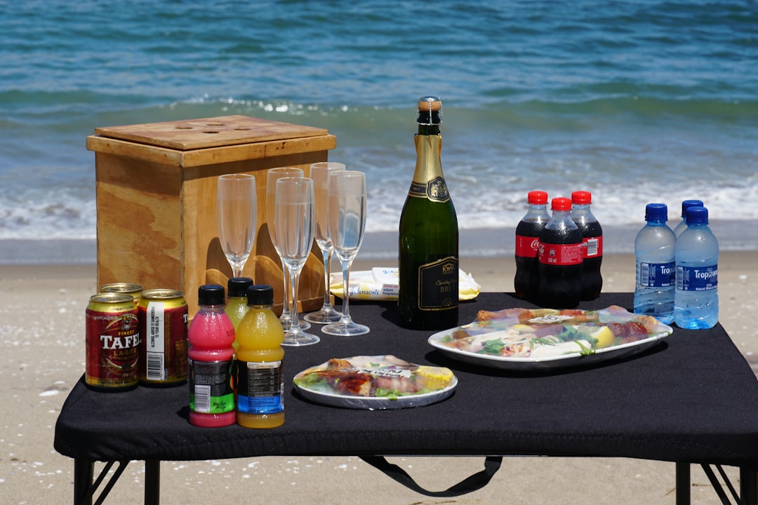 Glass beverage dispenser for outdoor entertaining