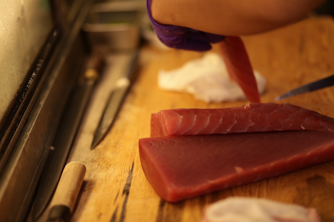 Professional 8-inch chef's knife on wooden cutting board
