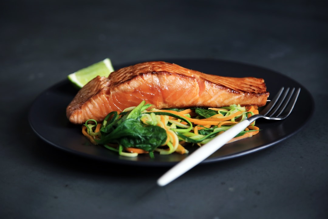 perfectly seared salmon fillet in pan
