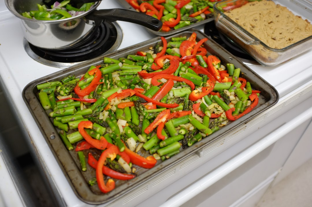 roasted vegetables spread on sheet pan