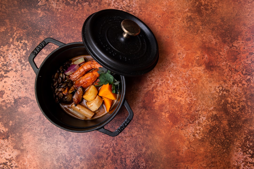 Cast iron pot braising on the stovetop