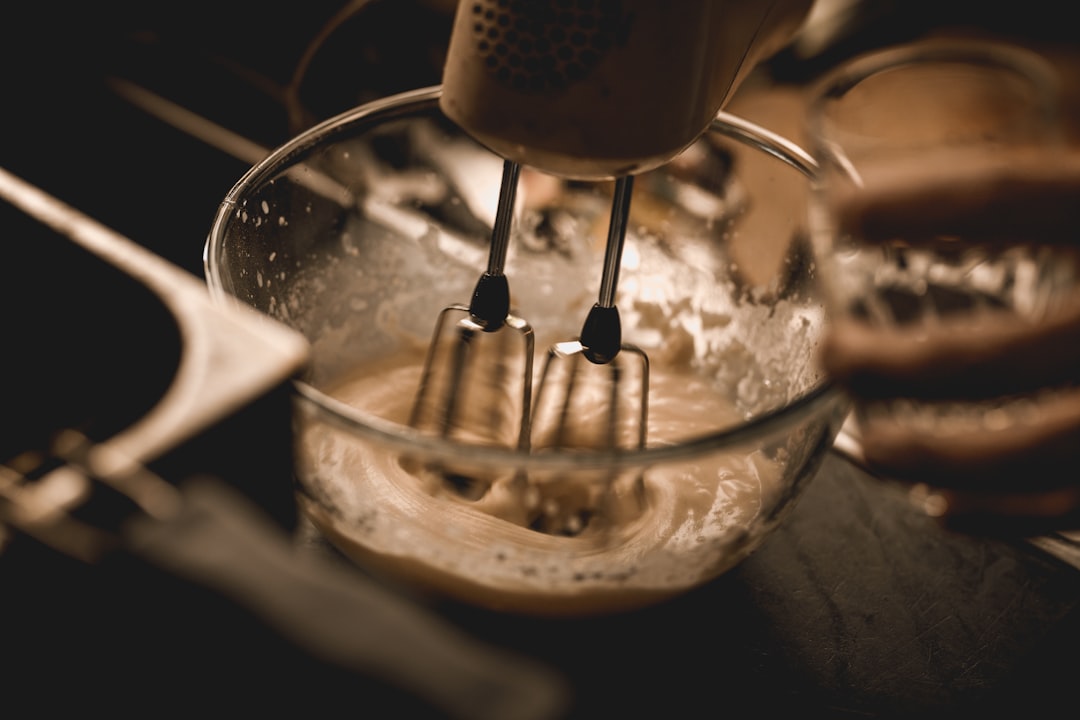 Mixing bowl with ingredients on kitchen counter