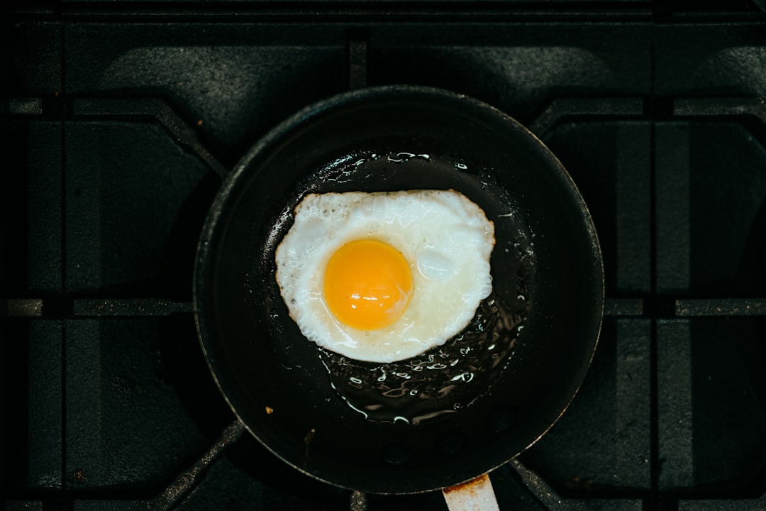 Electric egg cooker appliance on kitchen counter