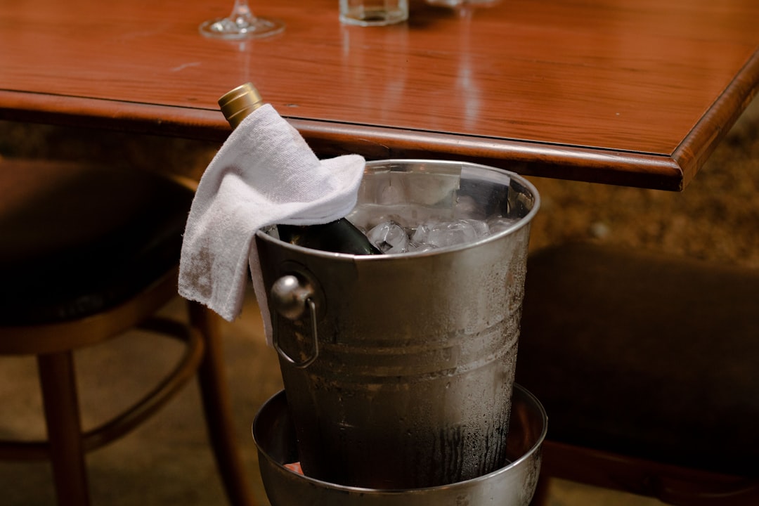 Insulated ice bucket on outdoor party table