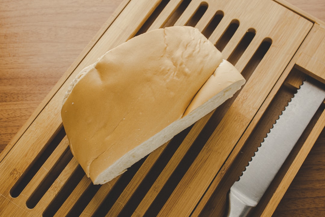 Neatly organized bamboo kitchen drawer with utensil dividers