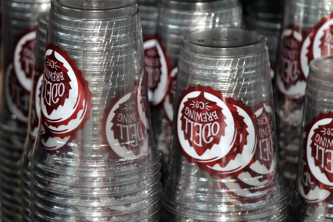 Clear plastic cups with colorful summer drinks