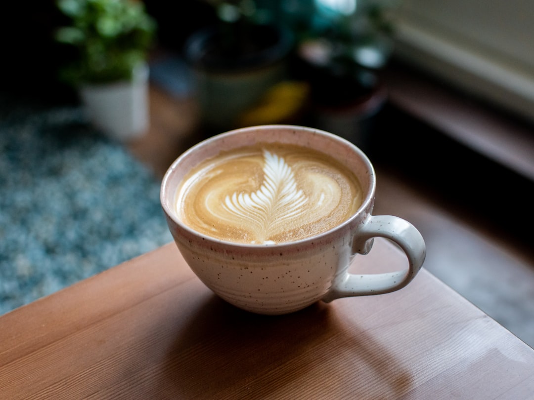 Finished cappuccino with latte art in cup