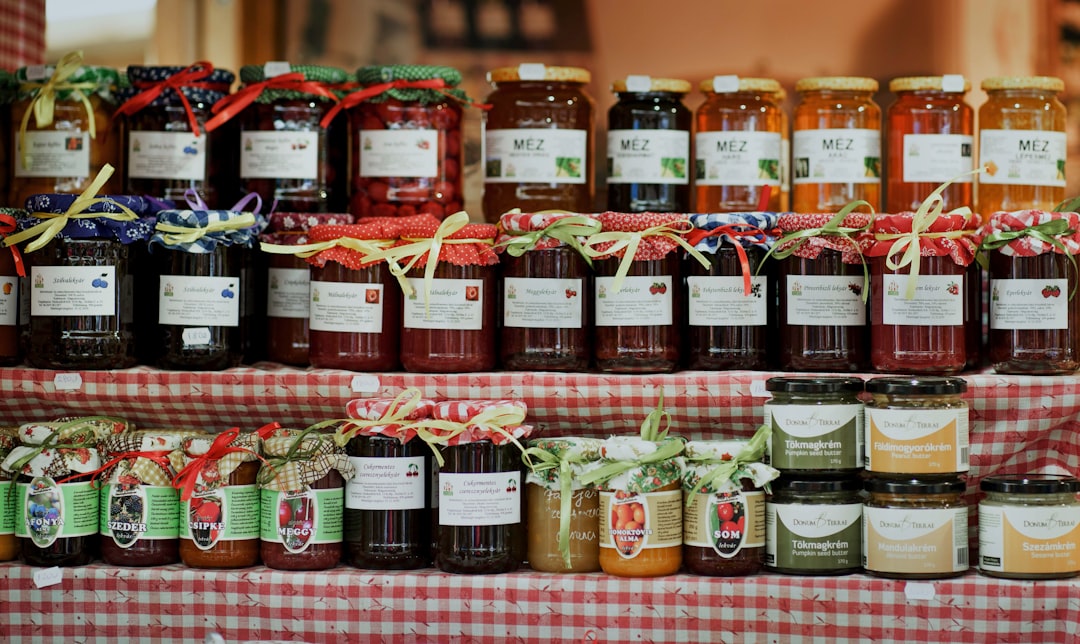 Homemade preserves and jam jars with labels ready for gifting
