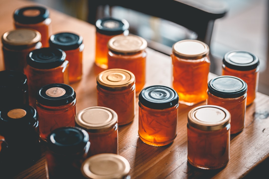 Canning jar lids and bands arranged on a kitchen towel