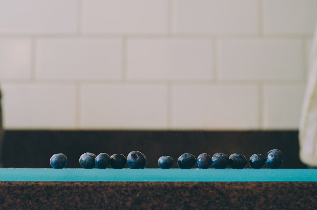 Fresh summer berries on kitchen counter