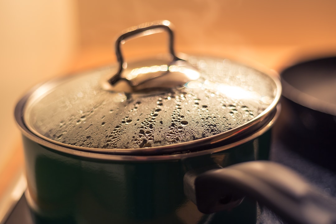 Saucepan with glass lid steaming