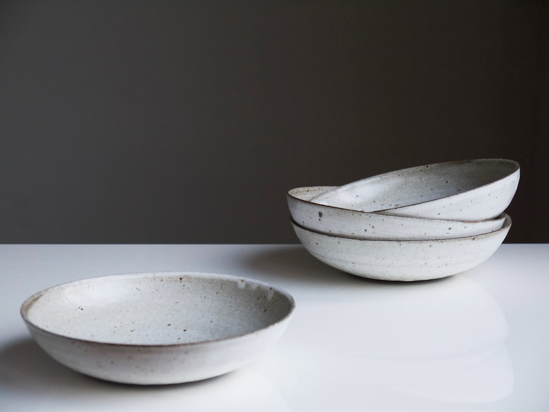 White ceramic dinner plates arranged on a table