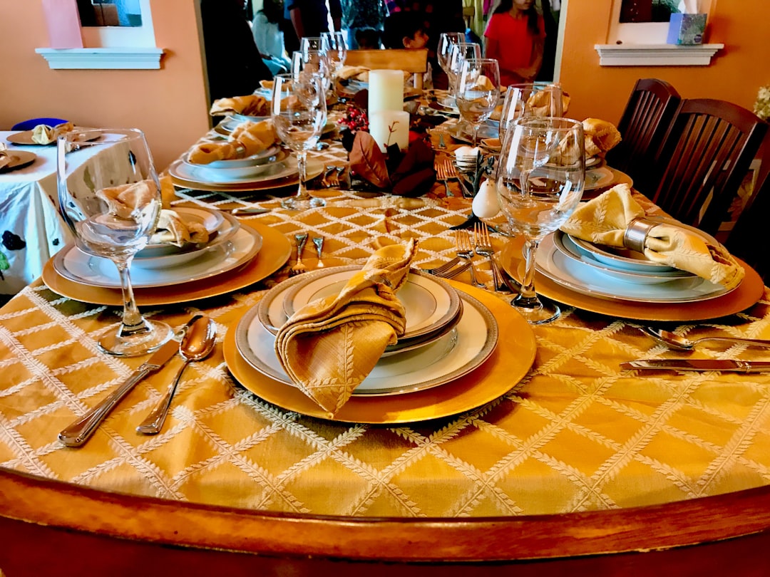 Family gathered around a dinner table sharing a meal