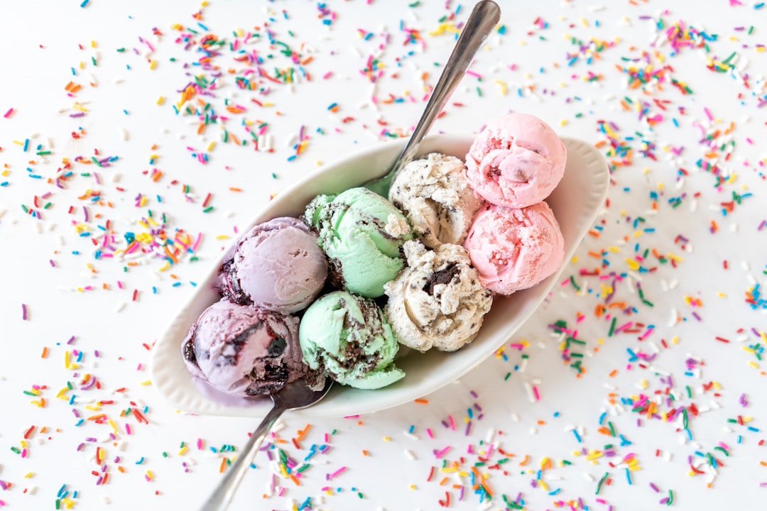 Cream being poured into an ice cream maker bowl