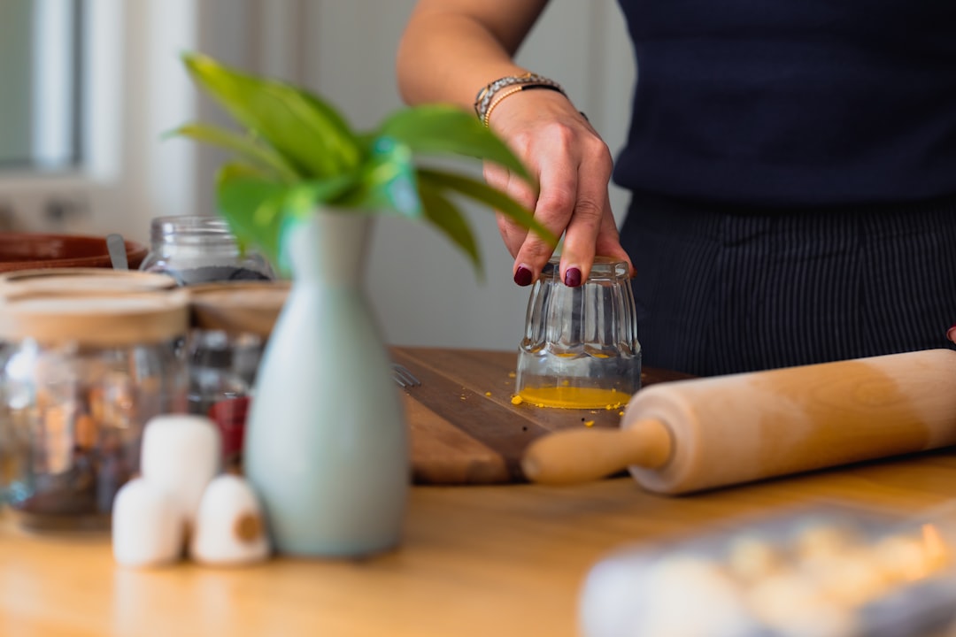 Candle making supplies on a kitchen counter