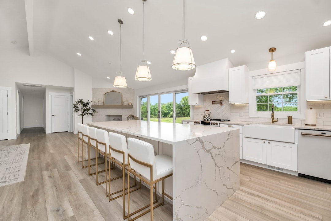 Bright modern kitchen with clean countertops and a stainless steel sink