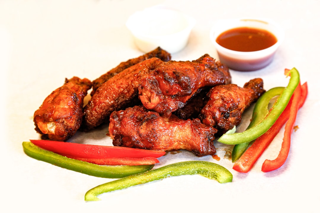 Crispy golden chicken wings on a plate