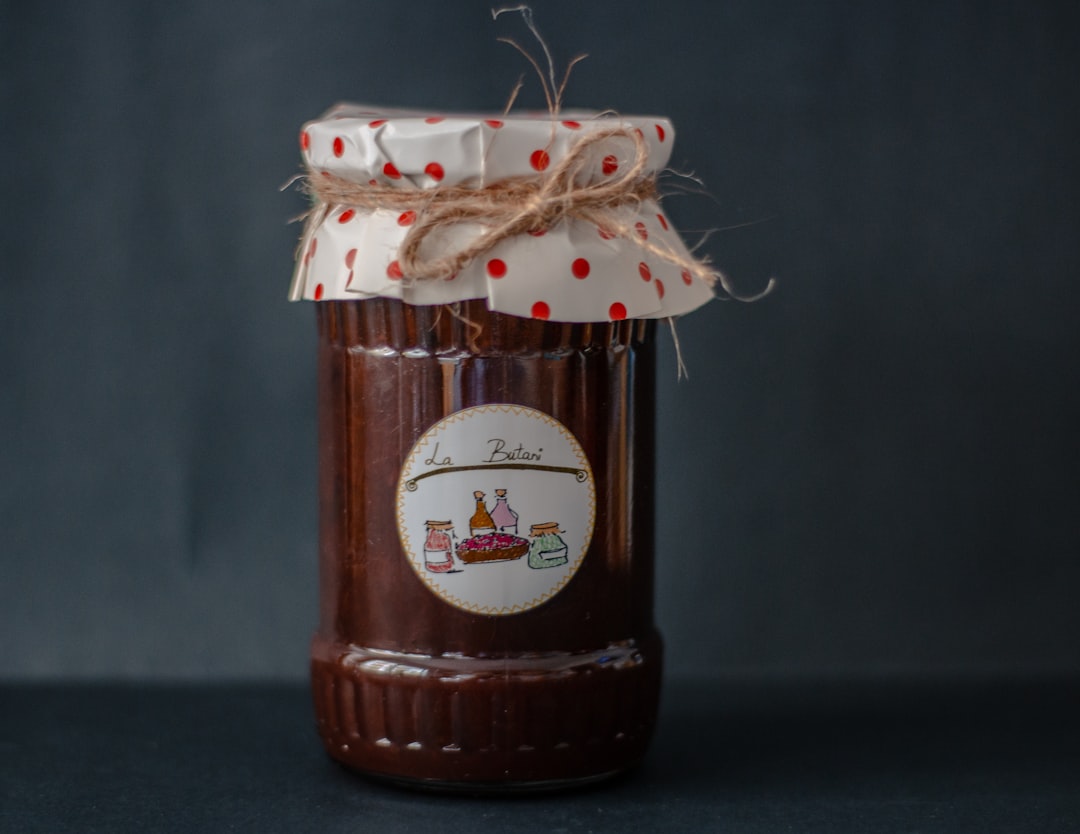 Fresh homemade strawberry jam in glass jars