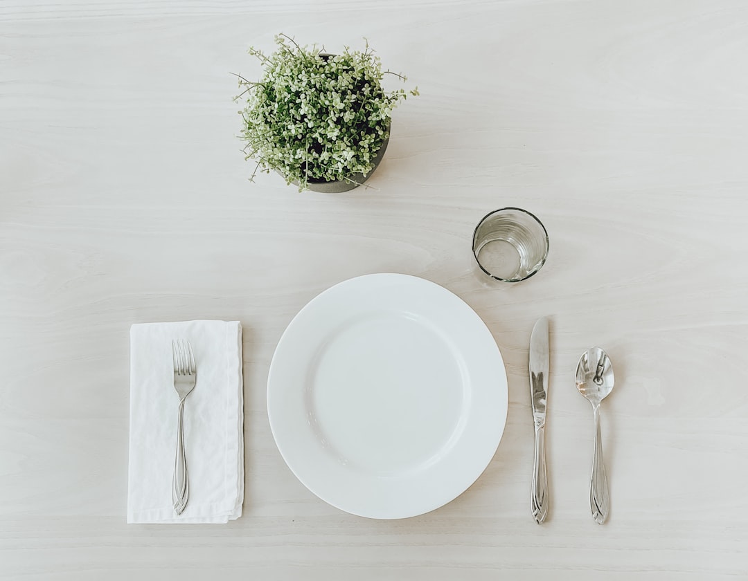 Folded cloth napkins neatly arranged on a set dining table