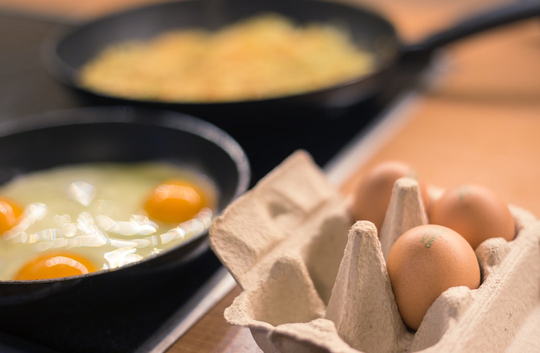 Close-up of an egg frying in a pan