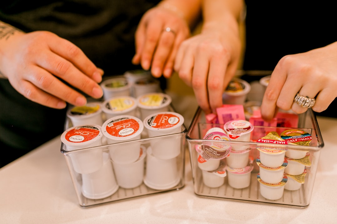 Pantry items spread across kitchen table during organization overhaul