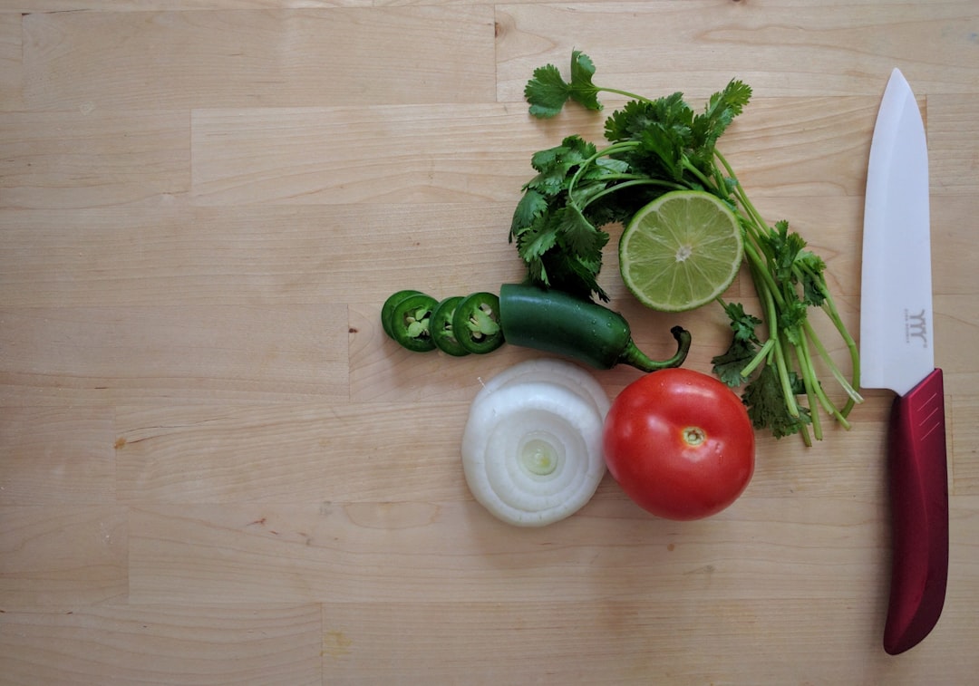Fresh tomatoes, peppers, and ingredients for homemade salsa