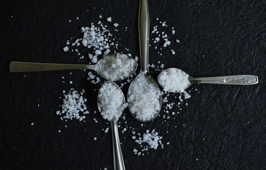 Seasoning food with kosher salt