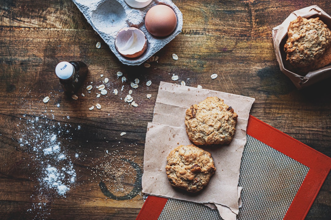 Silicone baking mat on a sheet pan with cookies