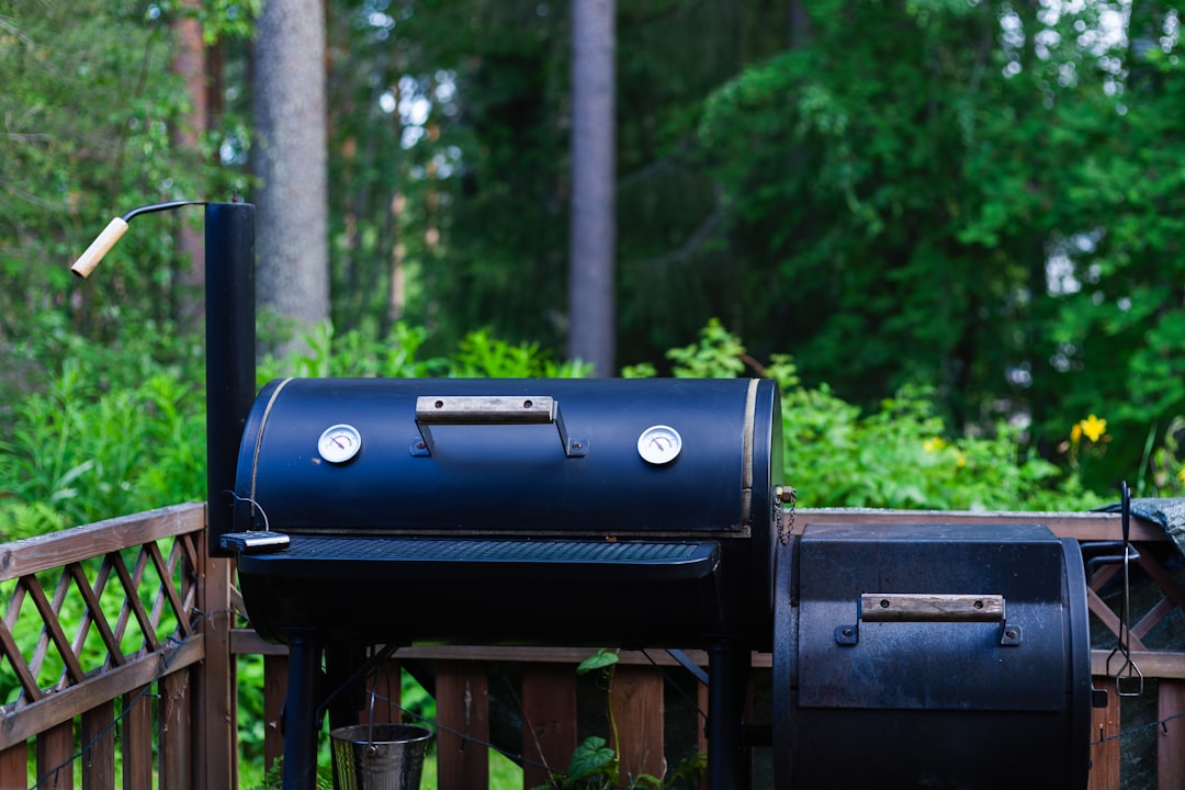 Barbecue smoker cooking in backyard