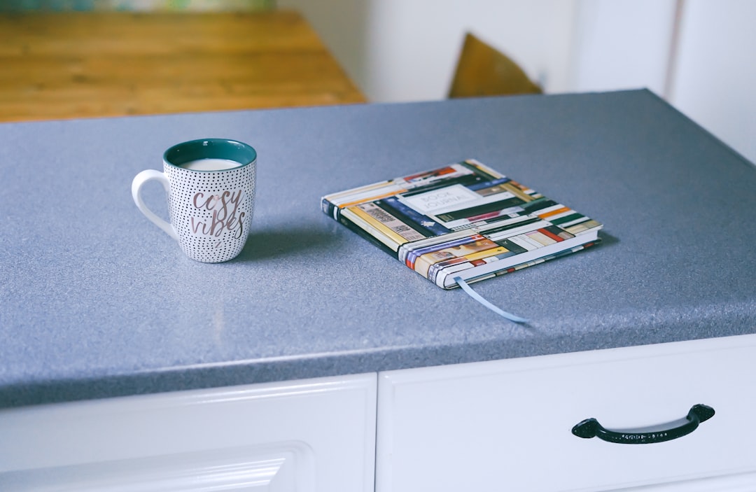 Clean organized kitchen counter with labeled storage containers