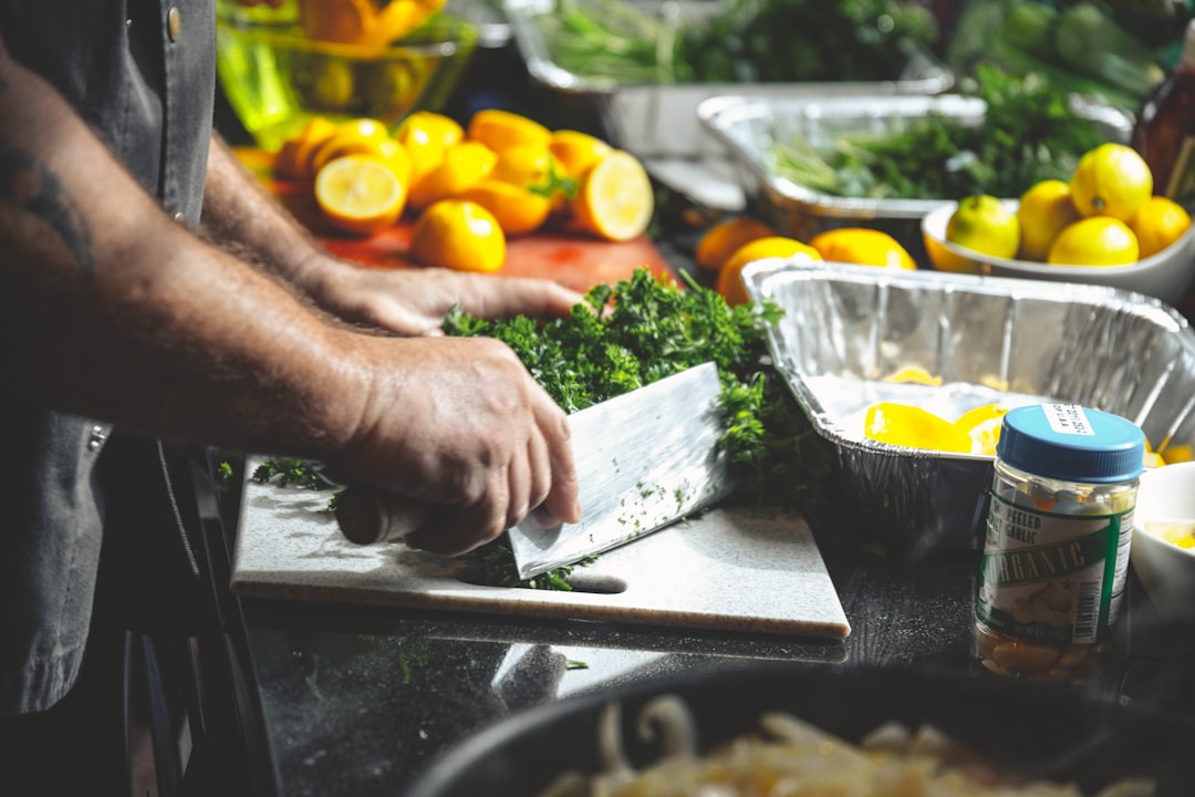 Vegetable mandoline slicing fresh produce on a kitchen counter