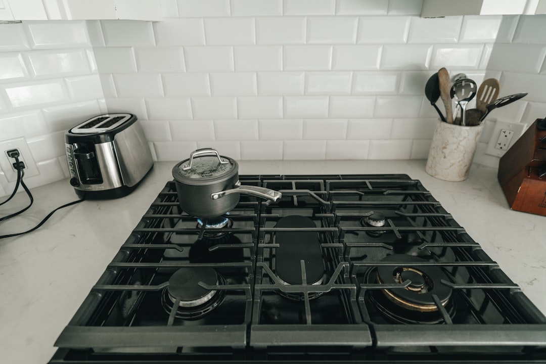 Portable induction burner on kitchen counter