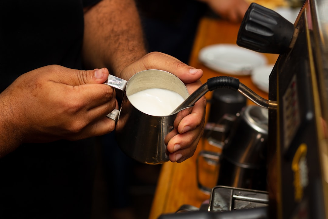 Stainless steel milk frothing pitcher