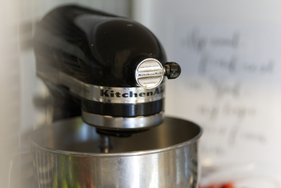 KitchenAid stand mixer on counter with flour
