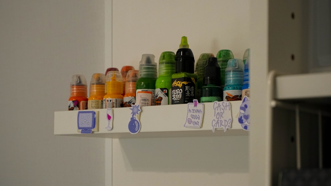Over-the-door hanging pantry rack loaded with spices and small jars