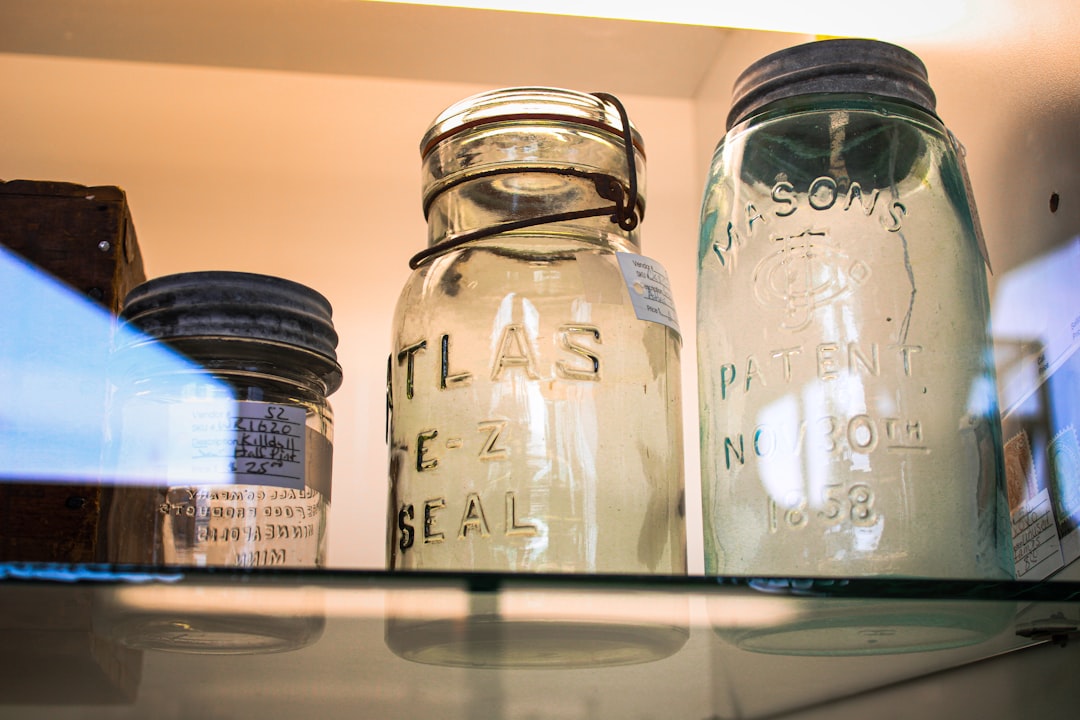 Glass mason jars filled with dry goods like flour and rice