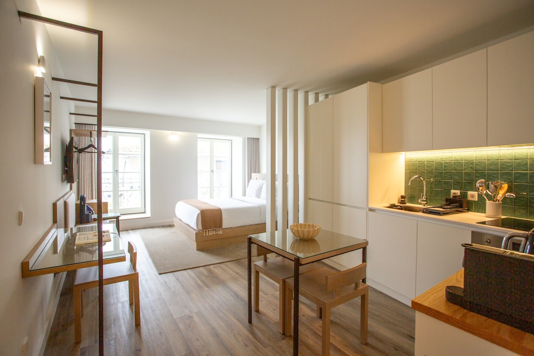 Compact studio apartment kitchen with essentials arranged efficiently