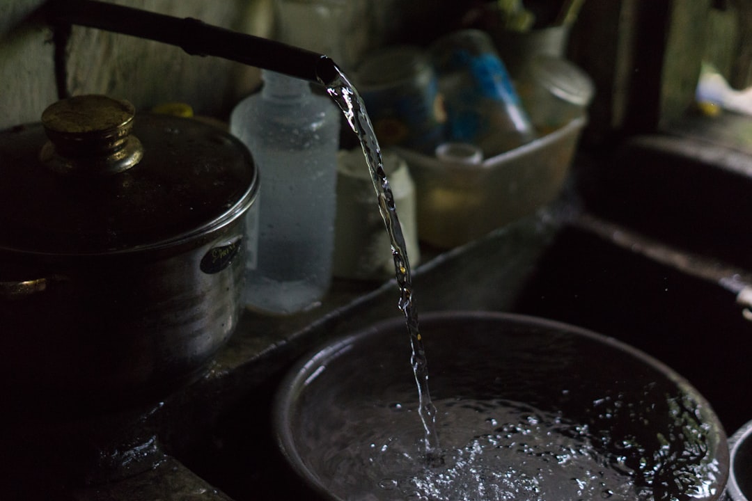 Washing rice in a bowl with clear water